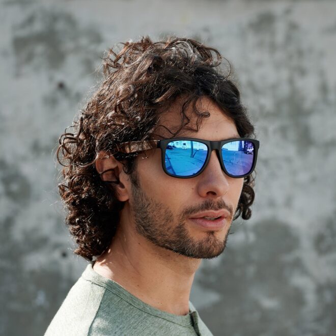 https://www.gowood.ca/wp-content/uploads/2019/05/SD-E2-B-square-ebony-wood-sunglasses-blue-lenses-model4-1500sq-660x660.jpg